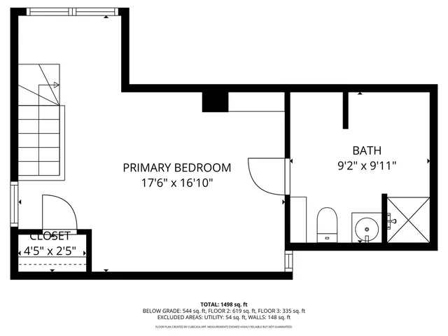 a picture of a bench in front of a building