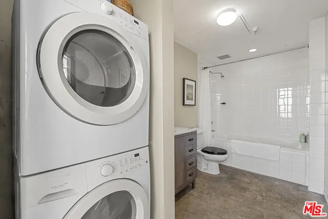 a bathroom with a sink toilet a tub and shower