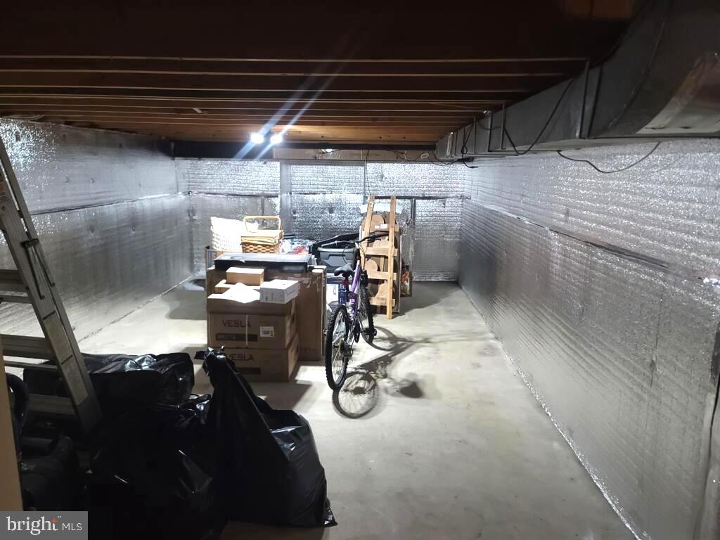 409 Jaystone Court Bowie, MD 20721 - Photo 43 of 51 Storage Area with Insulation and Vapor Barrier