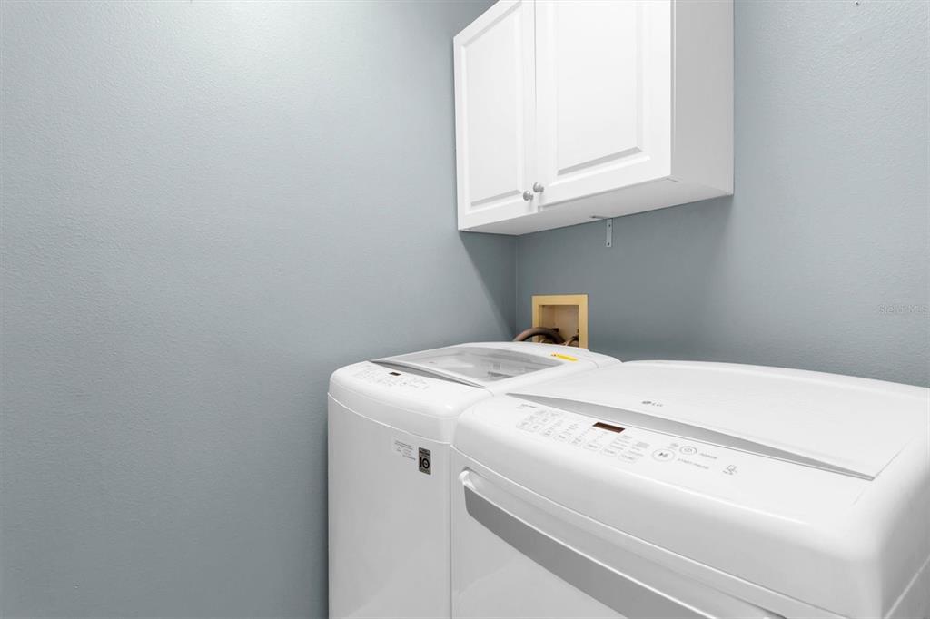 10121 Porch Street New Port Richey, FL 34655 - Photo 34 of 57 a utility room with dryer and washer