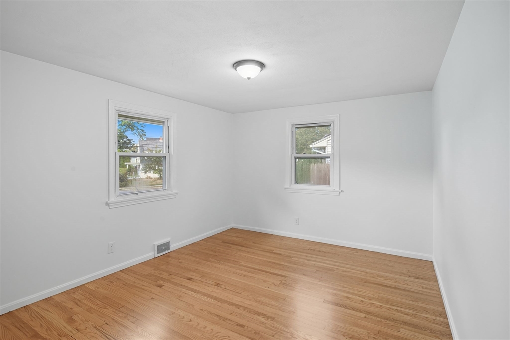11 Copeland Street Springfield, MA 01108 - Photo 13 of 27 a view of a room with wooden floor and window