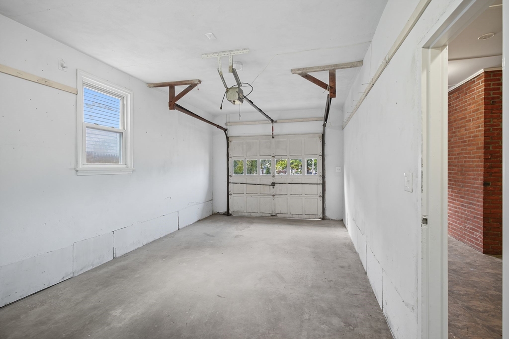 11 Copeland Street Springfield, MA 01108 - Photo 21 of 27 a view of a livingroom with an empty space and a window