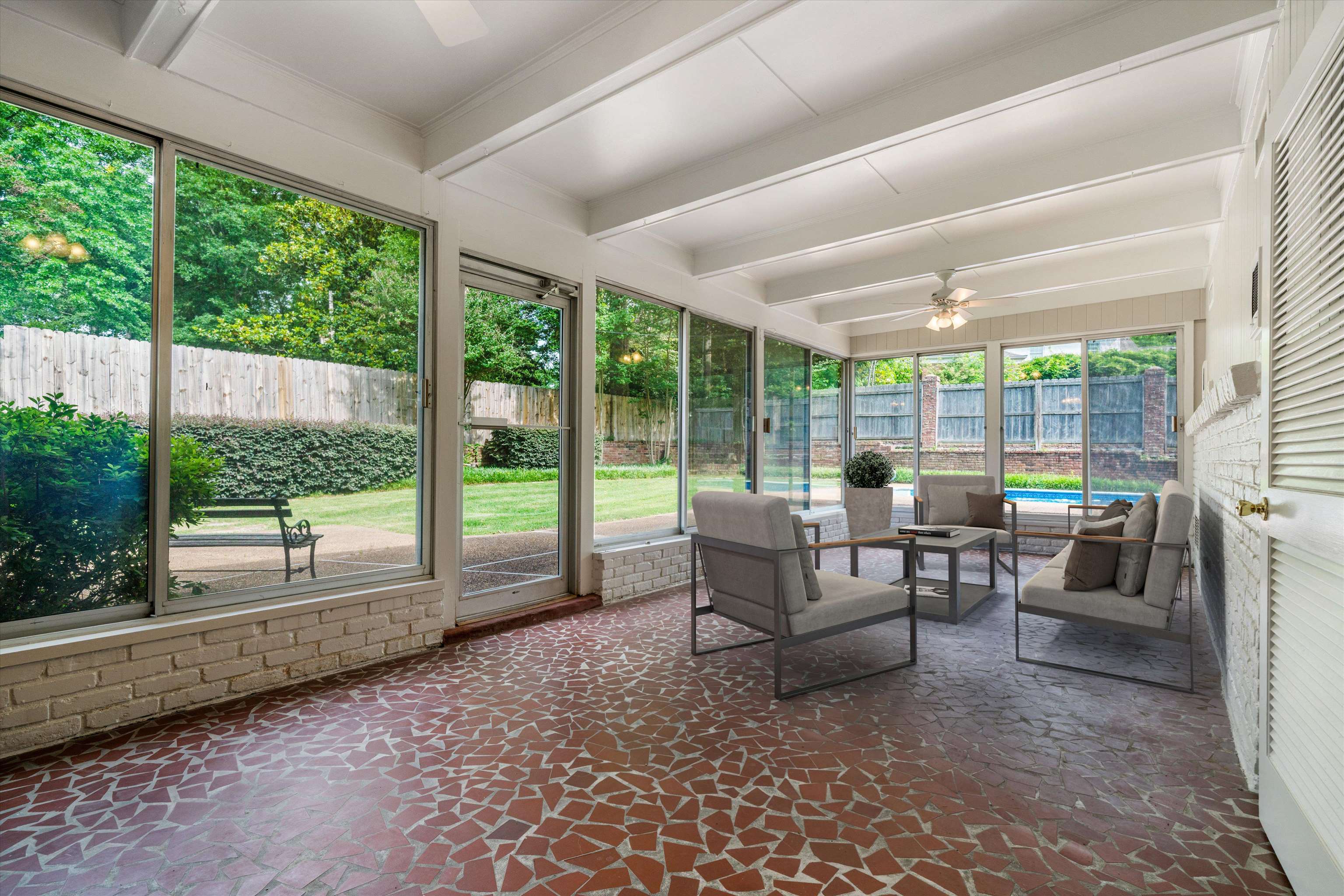 5670 North Angela Road Memphis, TN 38120 - Photo 20 of 22 a living room with furniture and floor to ceiling windows