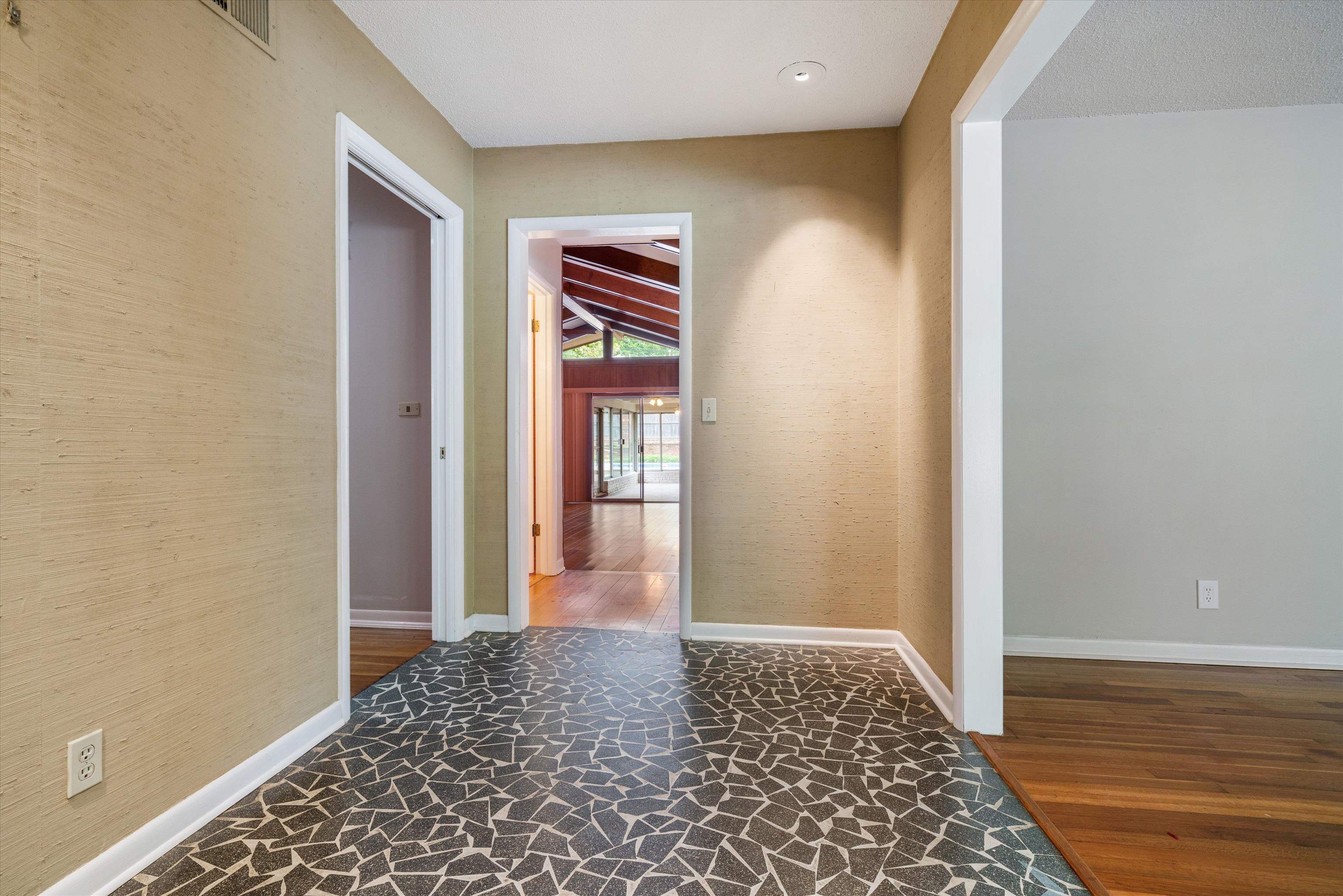 5670 North Angela Road Memphis, TN 38120 - Photo 3 of 22 a view of hallway with wooden floor