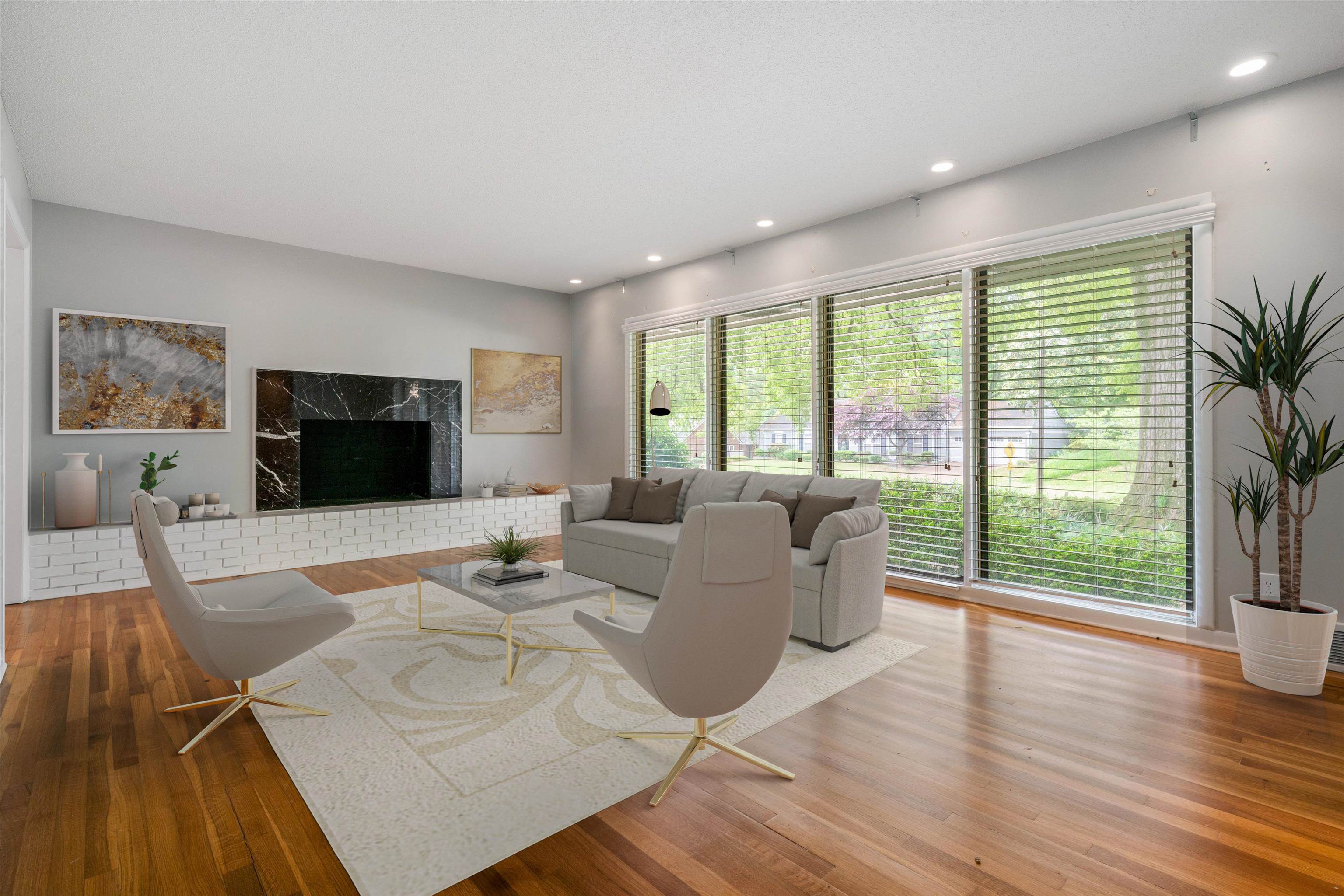 5670 North Angela Road Memphis, TN 38120 - Photo 4 of 22 a living room with furniture and a flat screen tv
