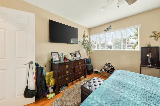 a backyard of a house with outdoor seating and trees