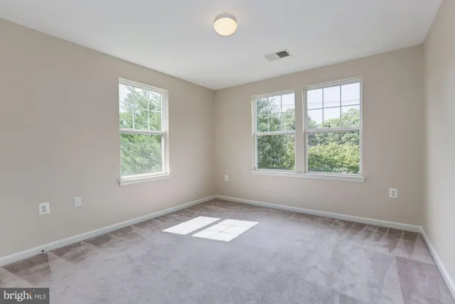 a view of empty room with window