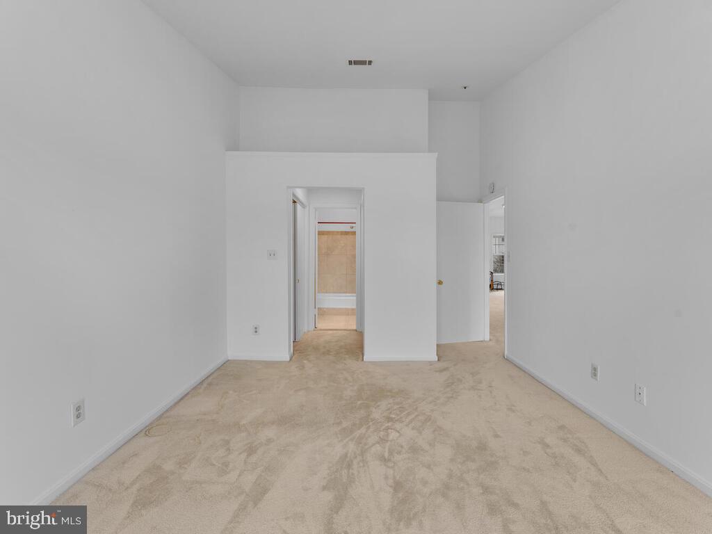 7806 Spinnaker Road, Unit 523 Laurel, MD 20707 - Photo 19 of 33 Owners suite w/ walk in closets & vaulted ceilings