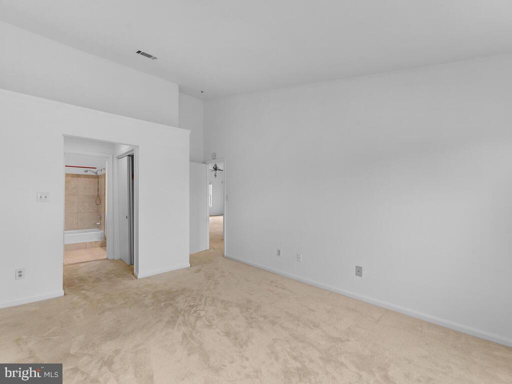 7806 Spinnaker Road, Unit 523 Laurel, MD 20707 - Photo 22 of 33 Owners suite w/ walk in closets & plant shelve