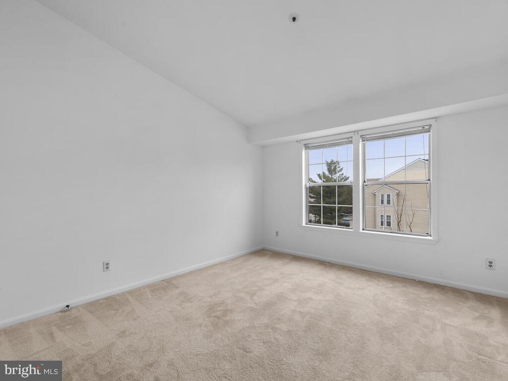 7806 Spinnaker Road, Unit 523 Laurel, MD 20707 - Photo 26 of 33 Spacious 2nd bedroom w/ vaulted ceilings