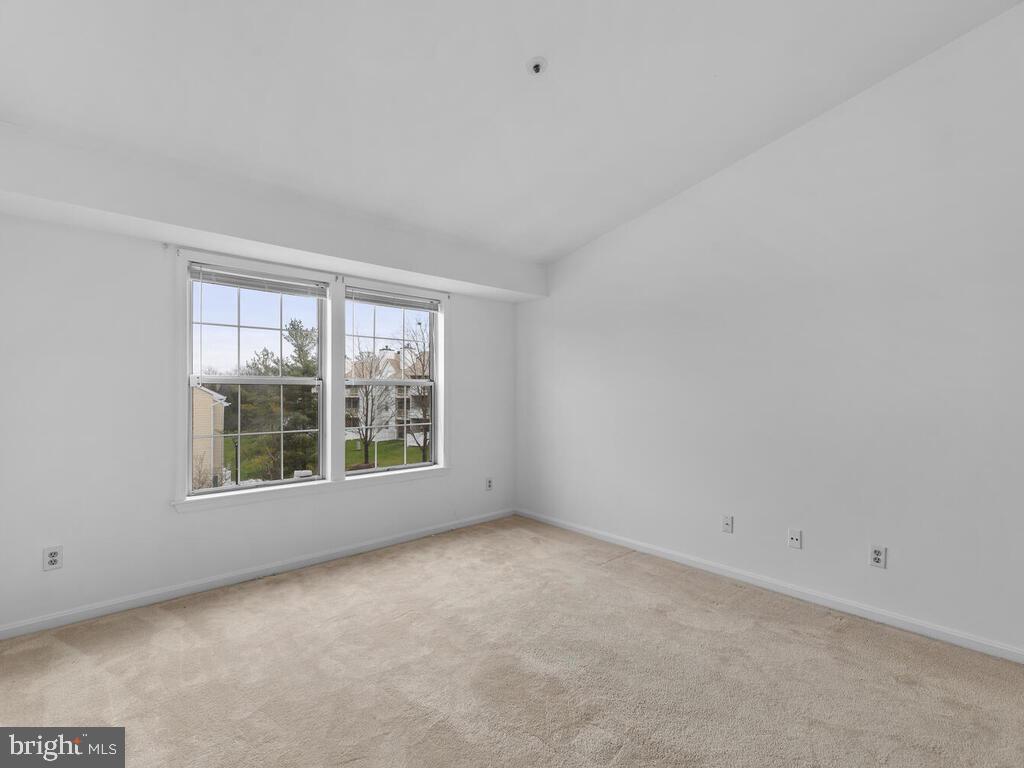 7806 Spinnaker Road, Unit 523 Laurel, MD 20707 - Photo 28 of 33 Spacious 2nd bedroom w/ vaulted ceilings