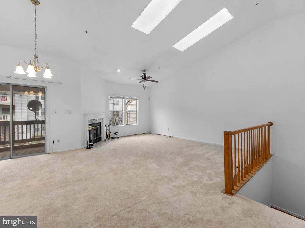 7806 Spinnaker Road, Unit 523 Laurel, MD 20707 - Photo 5 of 33 Living rm w/ wood burning FP & skylights