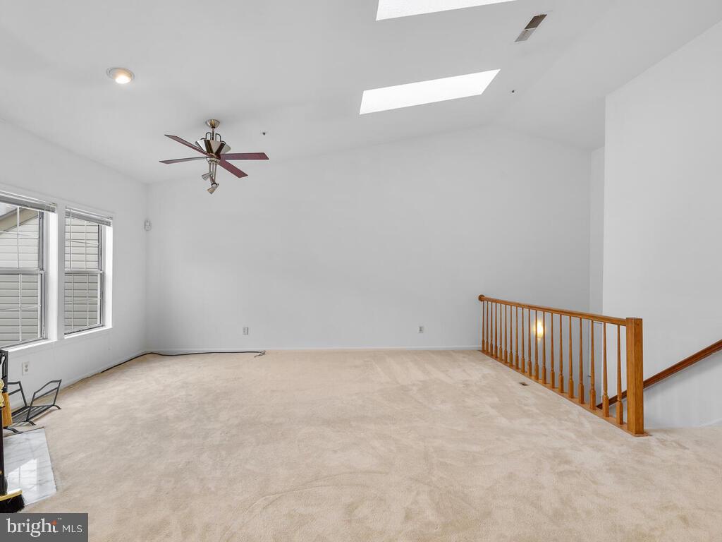 7806 Spinnaker Road, Unit 523 Laurel, MD 20707 - Photo 8 of 33 Living rm w/ wood burning FP & skylights