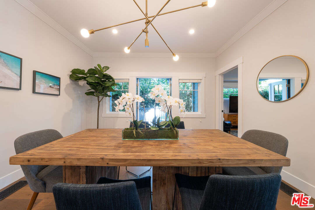 385 North Wilton Place Los Angeles, CA 90004 - Photo 12 of 53 a view of a dining room with furniture