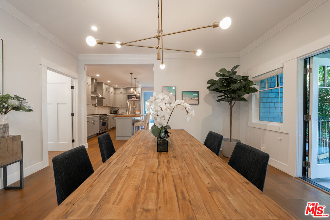 385 North Wilton Place Los Angeles, CA 90004 - Photo 14 of 53 a living room with furniture and a wooden floor