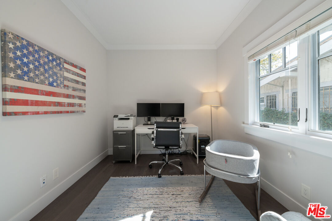385 North Wilton Place Los Angeles, CA 90004 - Photo 25 of 53 a view of a workspace with furniture and a window