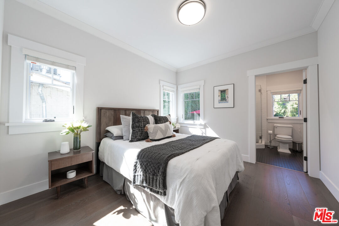 385 North Wilton Place Los Angeles, CA 90004 - Photo 27 of 53 a bed room with a bed and a window