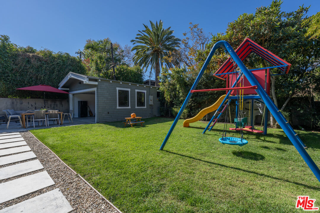 385 North Wilton Place Los Angeles, CA 90004 - Photo 47 of 53 a view of an house with backyard and swimming pool