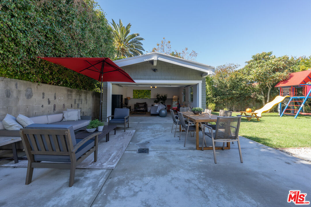 385 North Wilton Place Los Angeles, CA 90004 - Photo 48 of 53 a view of a house with backyard and sitting area