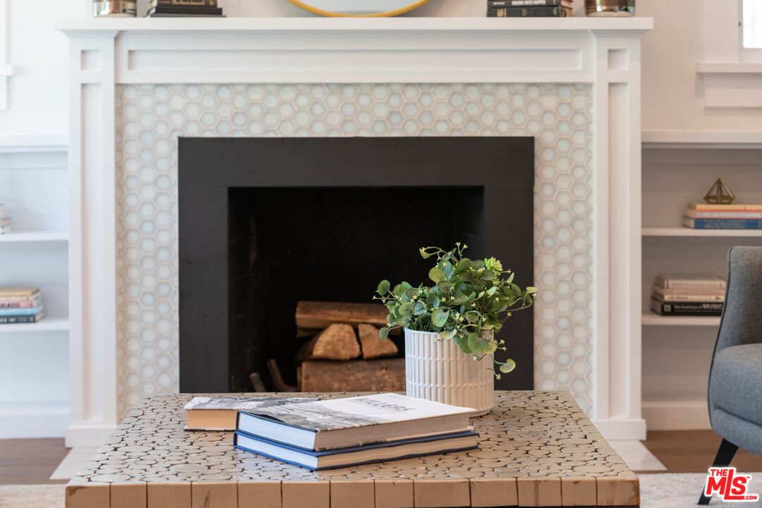 385 North Wilton Place Los Angeles, CA 90004 - Photo 7 of 53 a view of living room with furniture and a fireplace