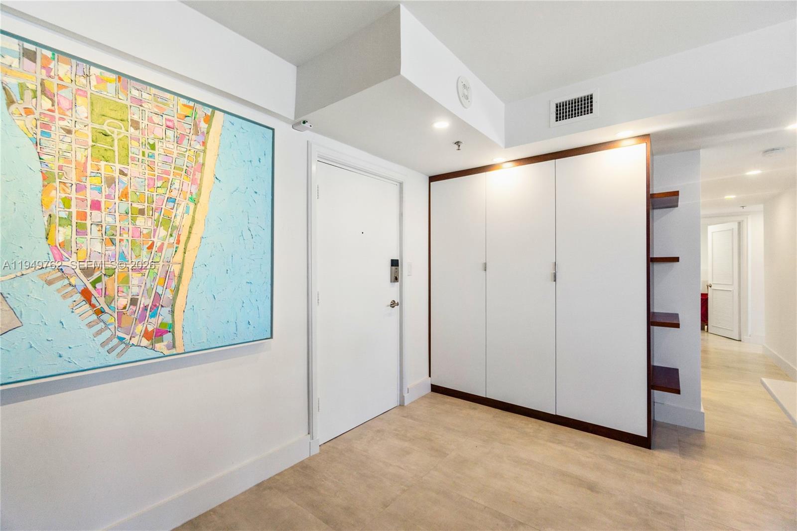 100 Lincoln Road, Unit 1447 Miami Beach, FL 33139 - Photo 11 of 39 a view of an empty room with a window