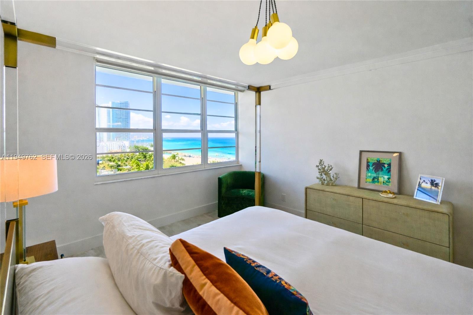 100 Lincoln Road, Unit 1447 Miami Beach, FL 33139 - Photo 19 of 39 a bedroom with a bed and a window