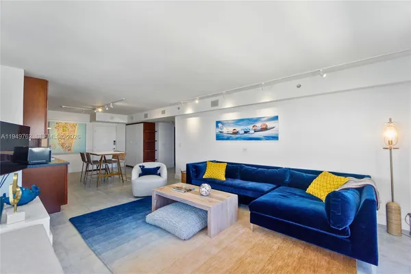 a living room with furniture and a couch