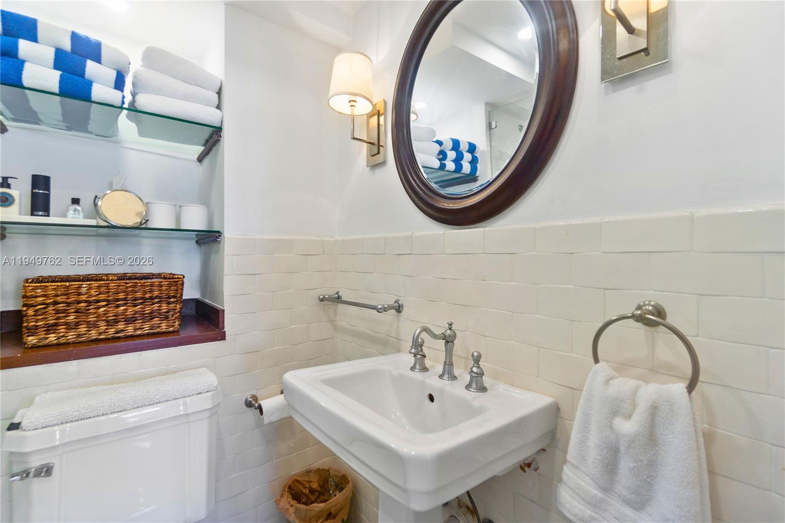 100 Lincoln Road, Unit 1447 Miami Beach, FL 33139 - Photo 21 of 39 a bathroom with a toilet and a sink