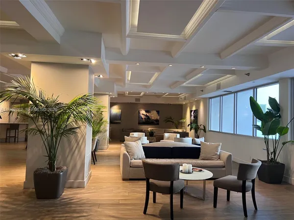 a kitchen with a table and chairs in it