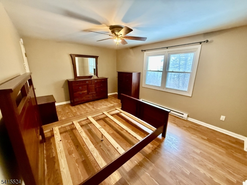 150 Karrville Road Port Murray, NJ 07865 - Photo 12 of 40 a living room with furniture rug and wooden floor