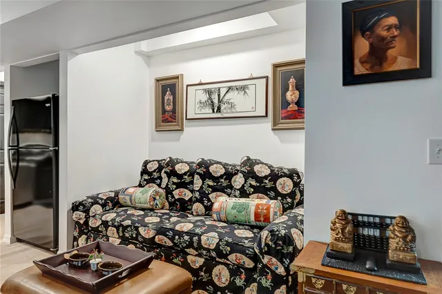 a view of a livingroom with furniture and a chandelier