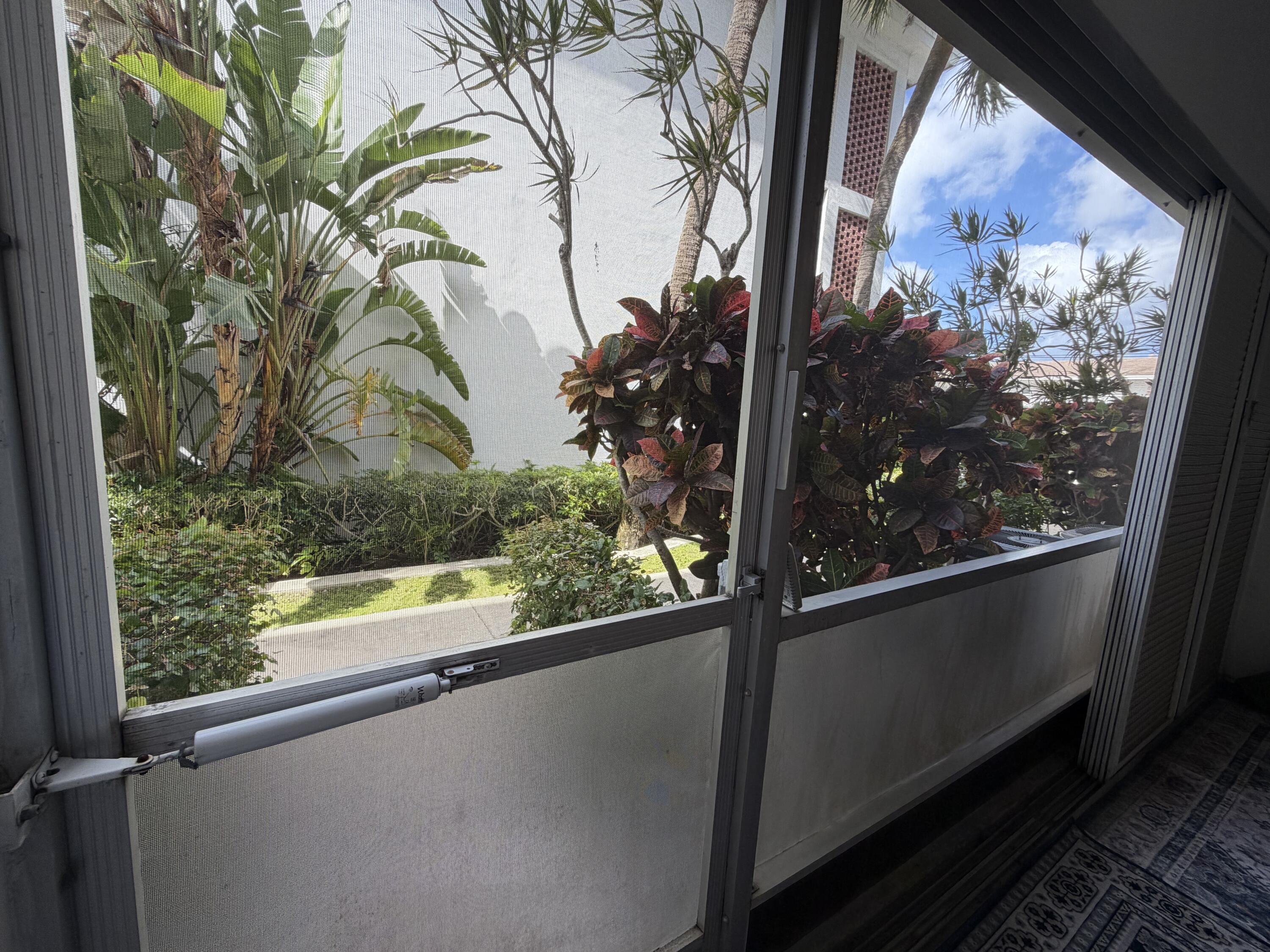 2050 Northeast 39th Street, Unit S103 Lighthouse Point, FL 33064 - Photo 46 of 46 a view of a window