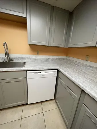 a utility room with a sink