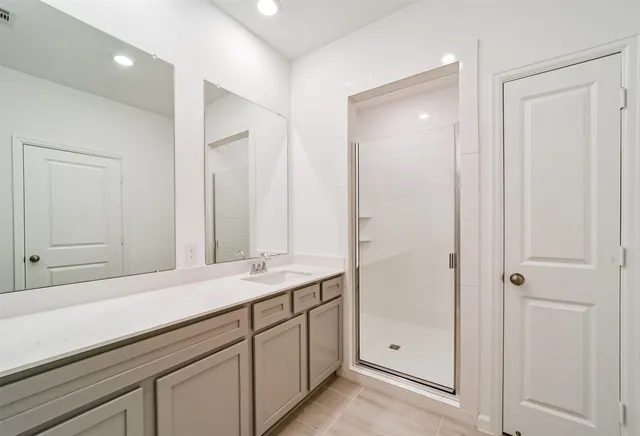 an empty room with an entrance to other room