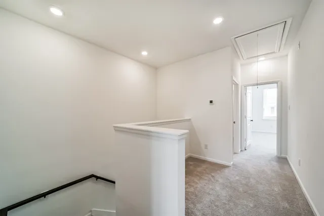 a kitchen with stainless steel appliances a sink stove and microwave