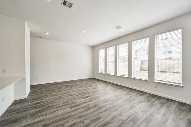 a bathroom with a sink toilet and a mirror