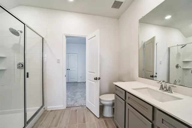 an empty room with closet area