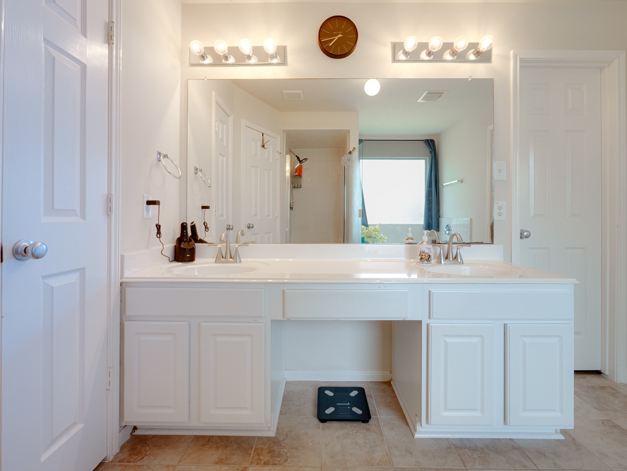 22106 Bridgestone Crossing Drive Spring, TX 77388 - Photo 19 of 26 Primary vanity has 2 sinks, and closet has lots of room inside.