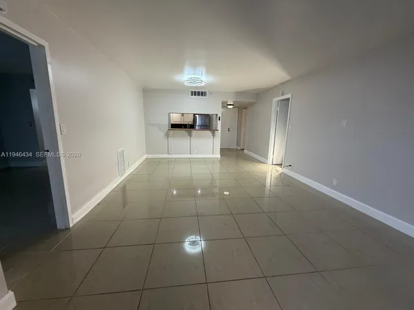 a view of a livingroom with a furniture