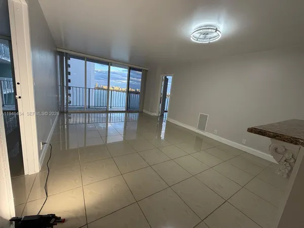 a view of a livingroom with furniture