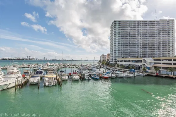 a view of a lake with building in front of it