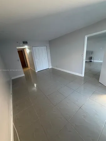 a bathroom with a sink toilet and mirror