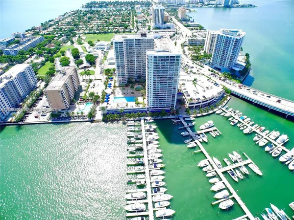 a view of a chairs and table in the patio