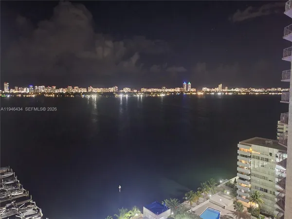 a work room with furniture and a window