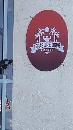 a bathroom with a glass shower door and a glass door