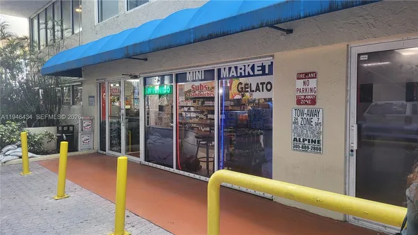 a view of a hallway with a livingroom