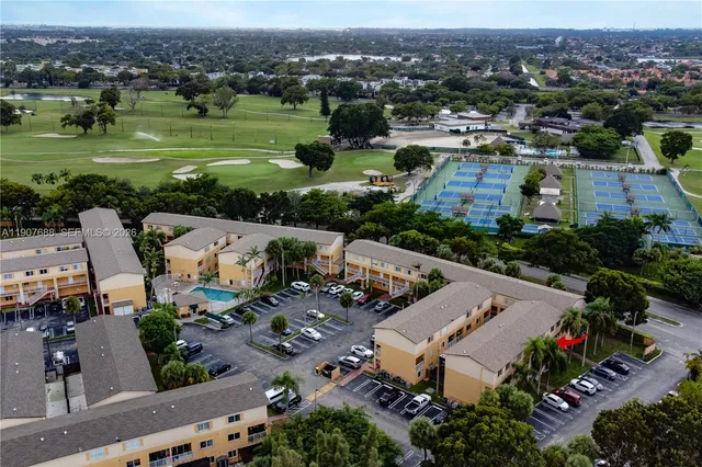 an aerial view of a house with a garden