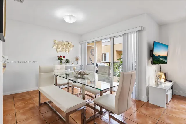 a view of a dining room with furniture window and outside view
