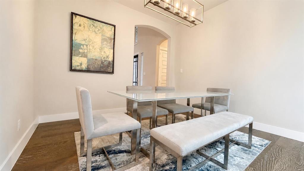912 Fallbrook Avenue Denton, TX 76210 - Photo 7 of 26 a view of a dining room with furniture