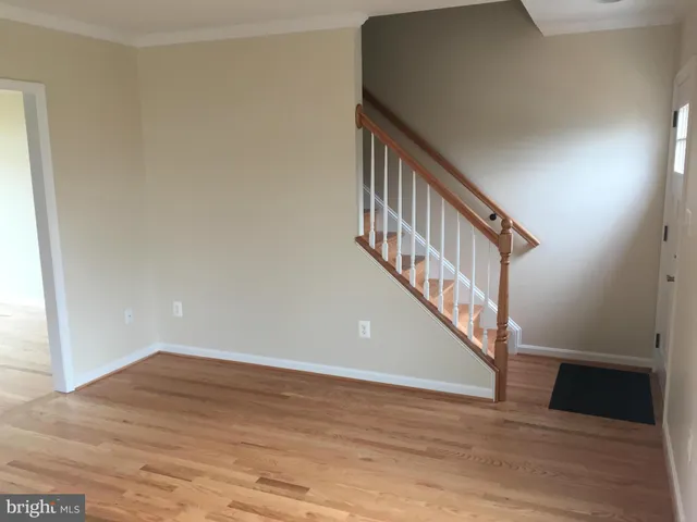 a view of entryway with wooden floor